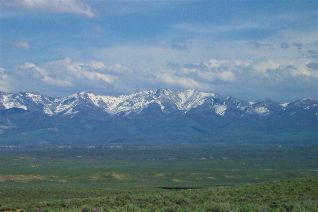 Large view of 4.77 ACRES IN BEAUTIFUL ELKO COUNTY, NEVADA ~ SPRING CREEK ~ MAJESTIC RUBY MOUNTAIN VIEWS AND TIMBERED! Photo 4