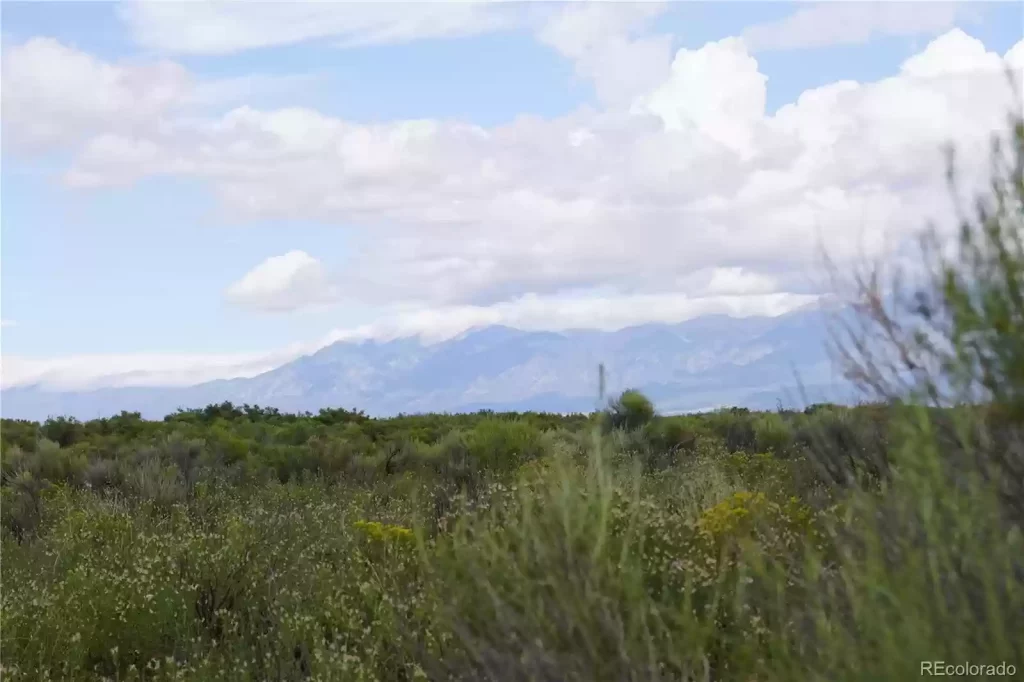 Large view of 9.98 ACRES IN SUNNY SOUTHERN COLORADO ~ BEAUTIFUL RANCH IN MT. BLANCA VALLEY RANCHES~ MILLION DOLLAR VIEWS! Photo 1