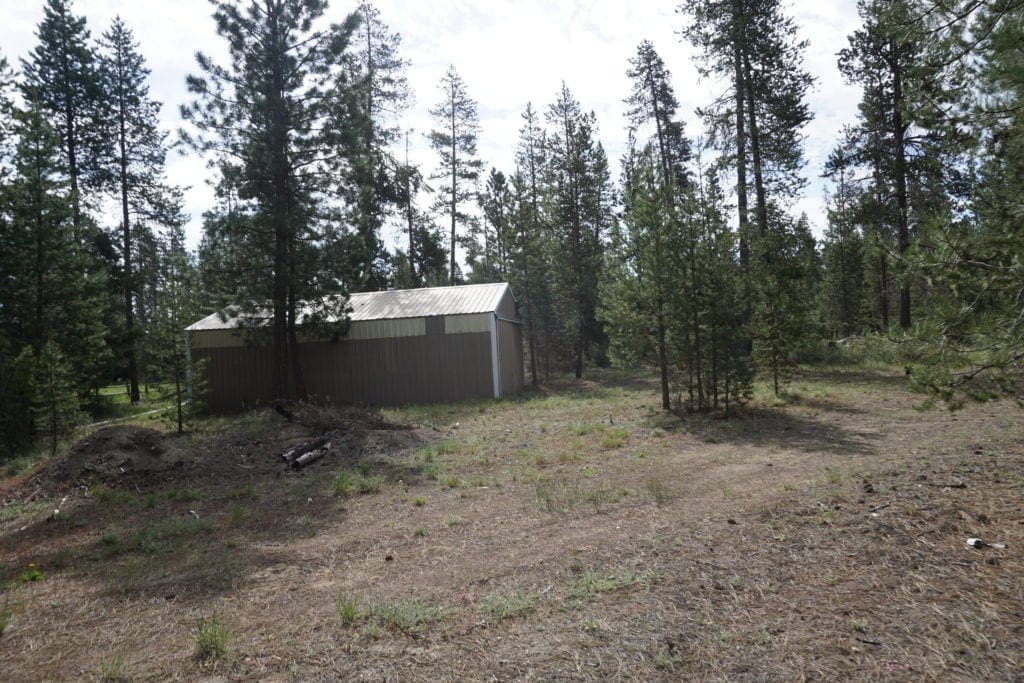 Large view of 1.00 Ac In Crescent Oregon! Treed Lot W/ Power & 20 X 30 Metal Building! Near BEND Photo 10