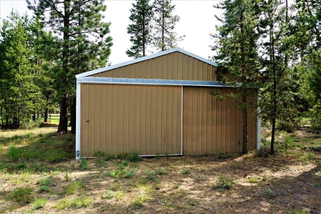 Large view of 1.00 Ac In Crescent Oregon! Treed Lot W/ Power & 20 X 30 Metal Building! Near BEND Photo 7