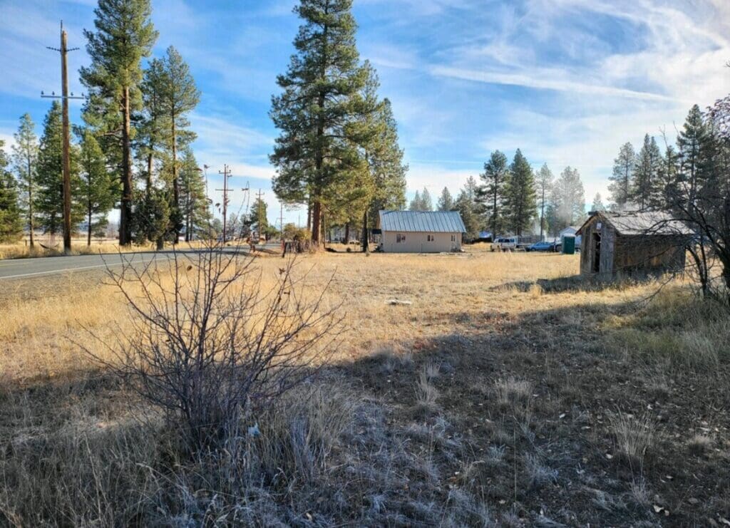 Large view of Great Building Lot in TOWN OF SPRAGUE RIVER WITH SHACK, TREES AND LIVE WATER SPICKET. Photo 1