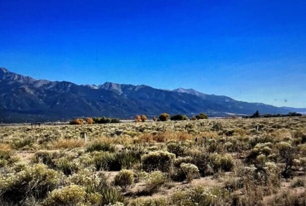 BEAUTIFUL BUILDING LOT NEAR CRESTONE, COLORADO WITH IMPROVED ROAD AND AMAZING 360 DEGREE MOUNTAIN VIEWS